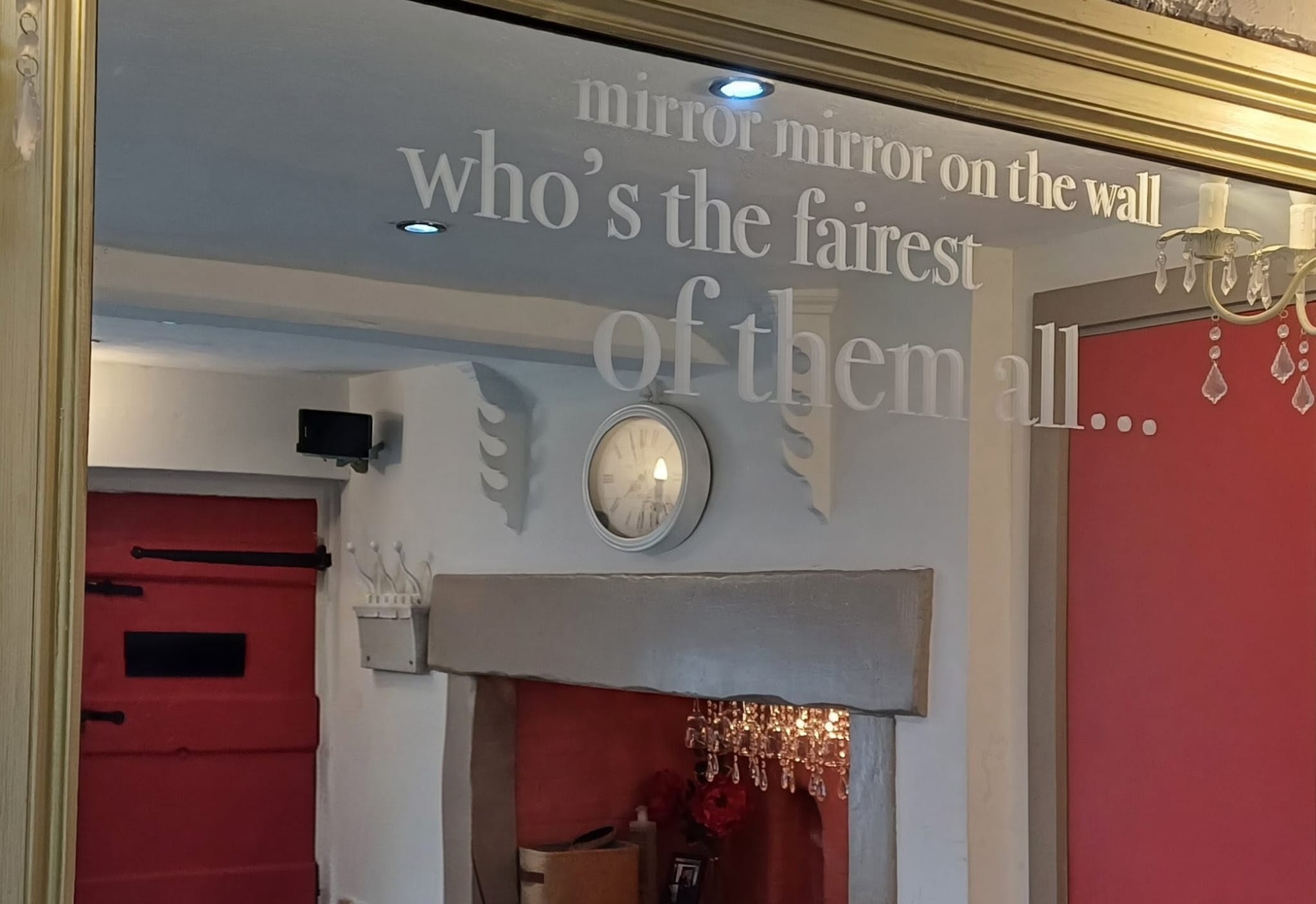 Howard's End's mirror wall and its playful fairest of them all lettering